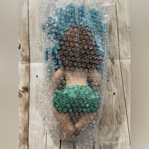 Collectible Porcelain Baby Doll Dressed in a Blue & Yellow Flower Costume - Picture 7 of 10